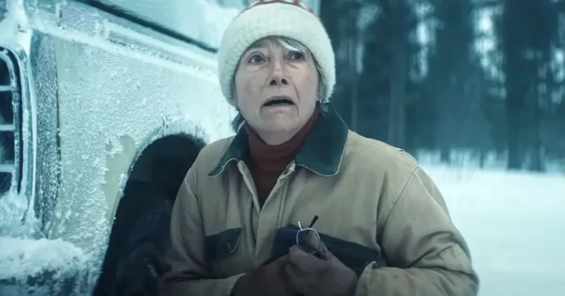 A atriz Emma Thompson com expressão de pavor sob uma nevasca no filme O Frio da Morte, destaque entre as estreias para ver no streaming.